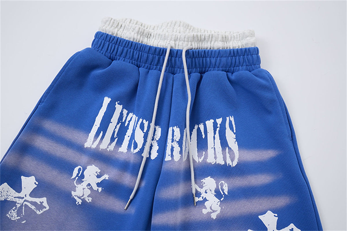 LETS ROCK CROSS SPRAY GRAPHIC SWEATPANTS; Blue; design detail
