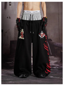LLF NUMBER CREST GRAPHIC SWEATPANTS; Black; model view