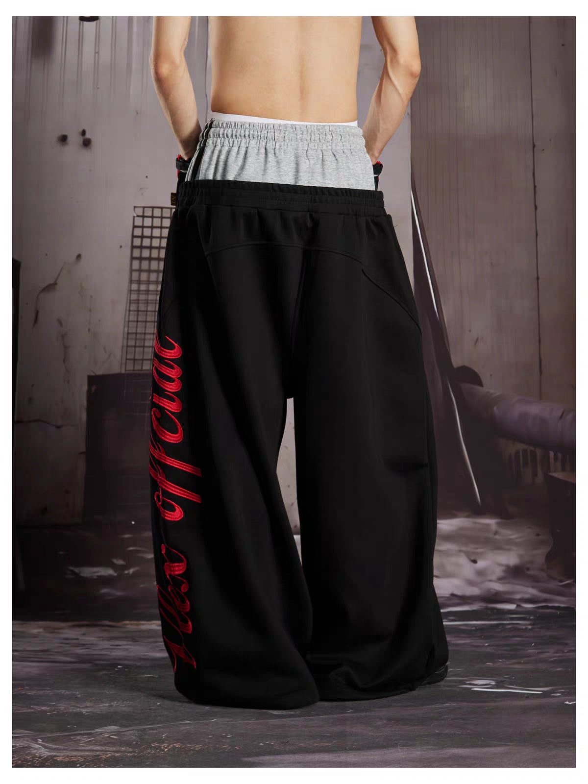 LLF NUMBER CREST GRAPHIC SWEATPANTS; Black; model view