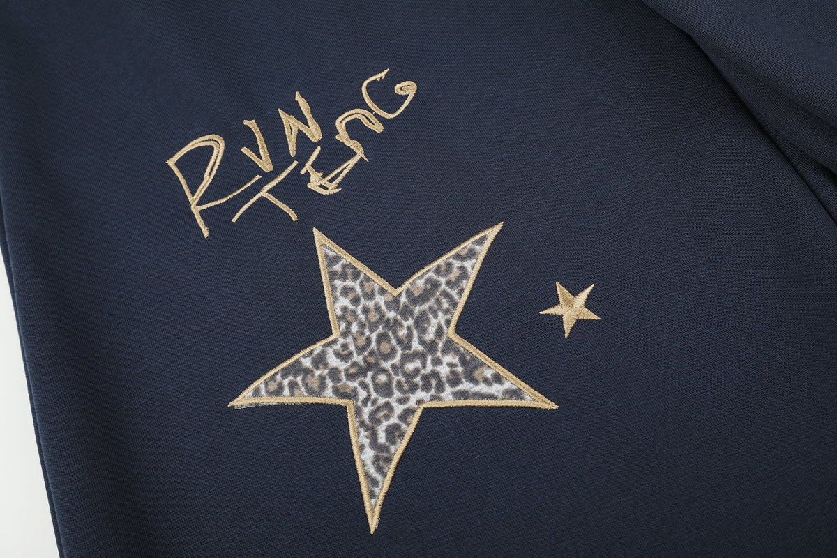 RVNTENG LEOPARD STAR BAGGY BARREL SWEATPANTS; Blue; design detail