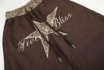 SEVEERS STAR SCRIPT GRAPHIC SWEATPANTS; Brown; design detail
