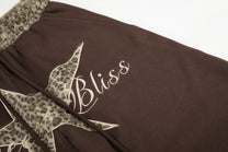 SEVEERS STAR SCRIPT GRAPHIC SWEATPANTS; Brown; design detail