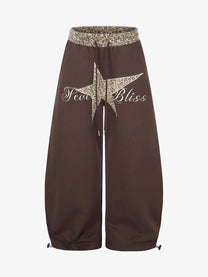 SEVEERS STAR SCRIPT GRAPHIC SWEATPANTS; Brown; front view