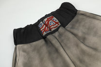 SEVEERS GRADIENT CROSS GRAPHIC SWEATPANTS; Apricot; design detail