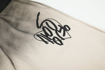 SEVEERS GRADIENT CROSS GRAPHIC SWEATPANTS; Apricot; design detail