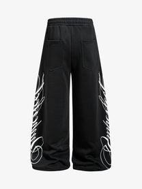 SKATE PARK CAMO DRAWSTRING BAGGY SWEATPANTS; Black; back view
