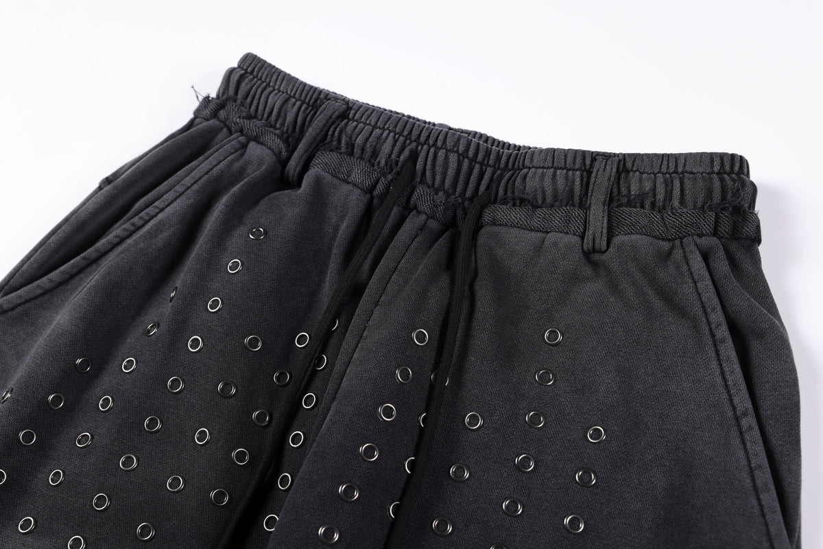 SMK MADE STUDDED WASHED WIDE LEG PANTS; Black; design detail