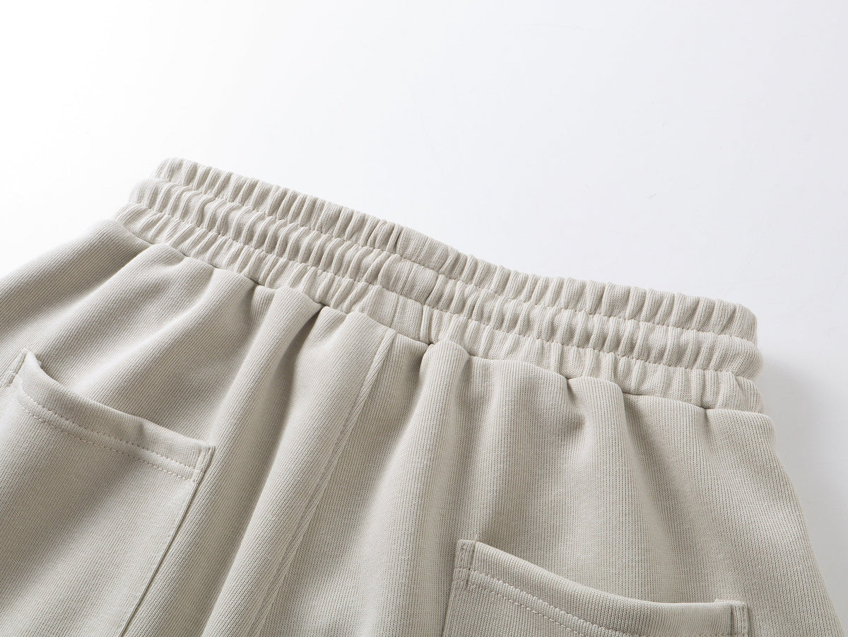 SMK MADE THORN PRINT BAGGY BARREL SWEATPANTS; Beige; garment construction detail