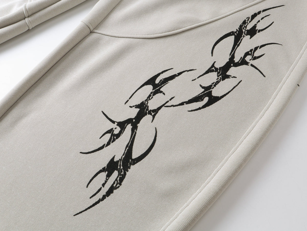 SMK MADE THORN PRINT BAGGY BARREL SWEATPANTS; Beige; design detail