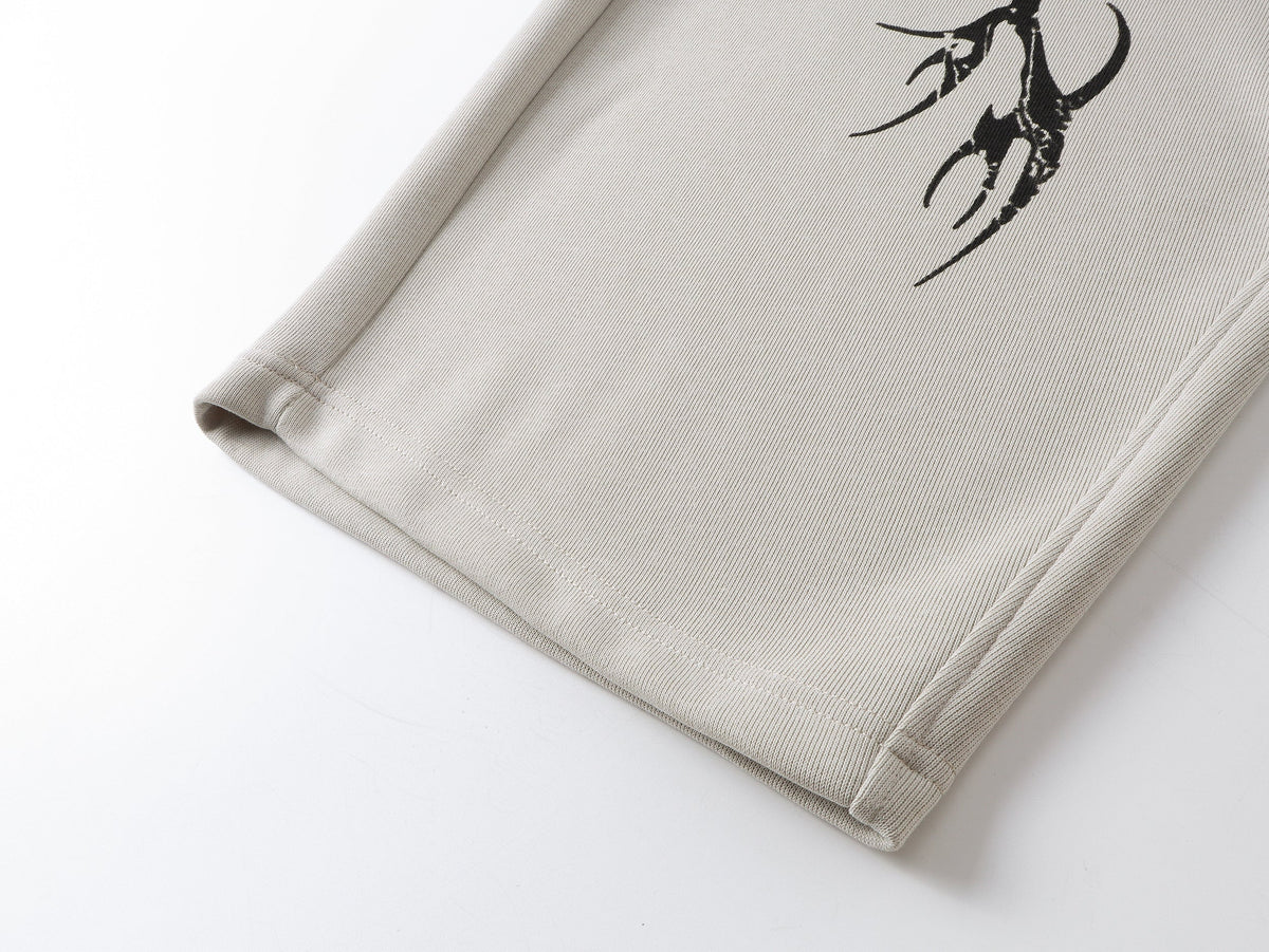 SMK MADE THORN PRINT BAGGY BARREL SWEATPANTS; Beige; design detail