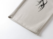 SMK MADE THORN PRINT BAGGY BARREL SWEATPANTS; Beige; design detail