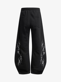 SMK MADE THORN PRINT BAGGY BARREL SWEATPANTS; Black; back view