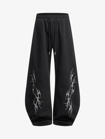 SMK MADE THORN PRINT BAGGY BARREL SWEATPANTS; Black; front view