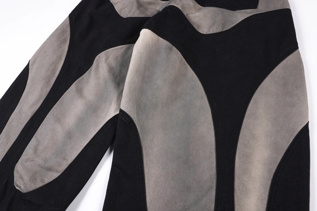 SMK MADE ABSTRACT STAR PANEL PANTS; Black; design detail