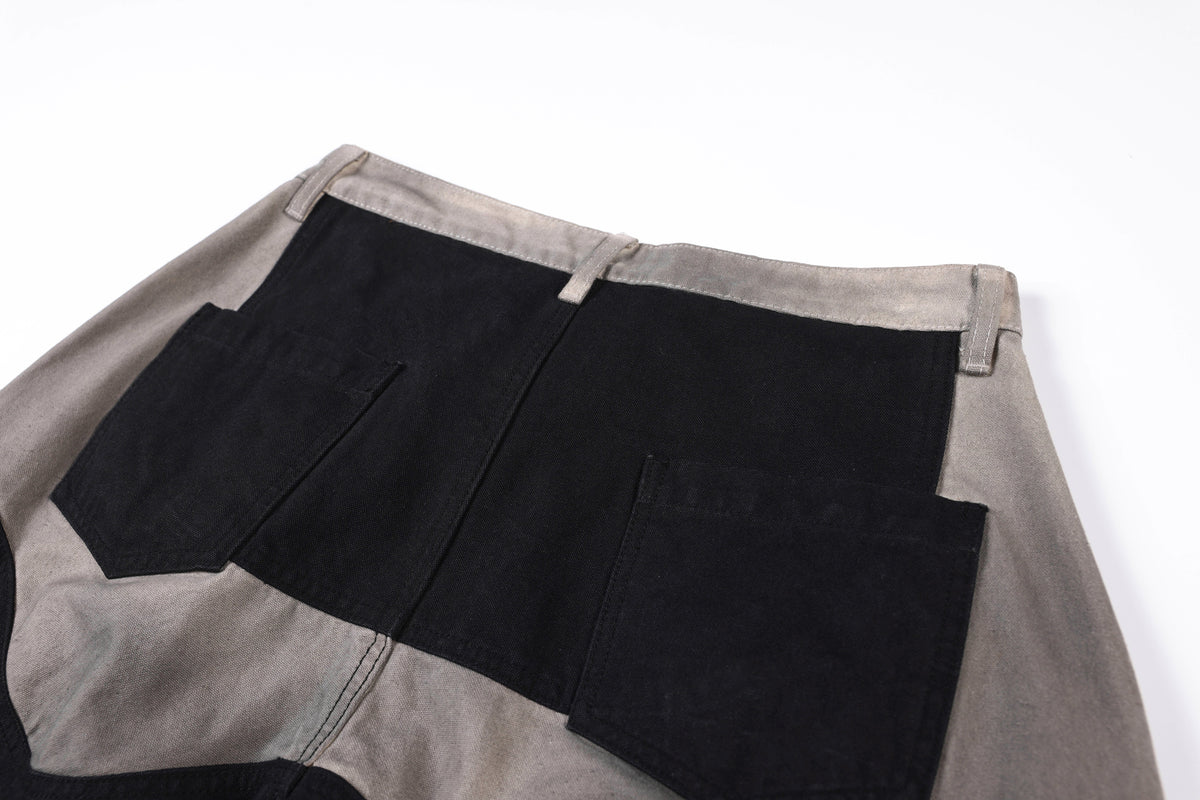 SMK MADE ABSTRACT STAR PANEL PANTS; Black; garment construction detail