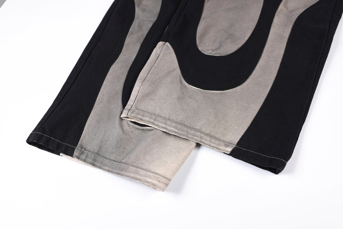 SMK MADE ABSTRACT STAR PANEL PANTS; Black; garment construction detail