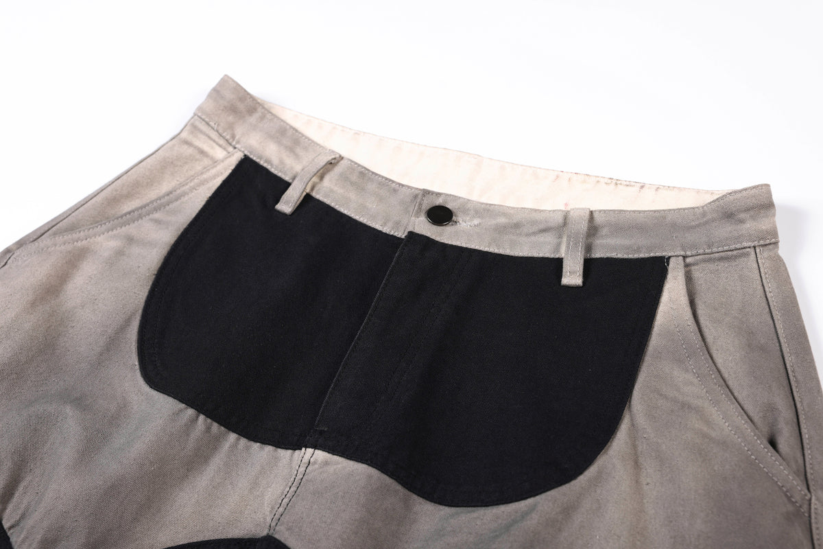 SMK MADE ABSTRACT STAR PANEL PANTS; Black; garment construction detail