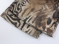 VLEX OFFICIAL ABSTRACT POSTER PRINT PANTS; Brown; design detail