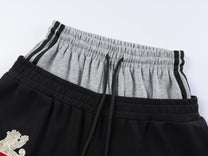 VLEX OFFICIAL RACING EMBLEM GRAPHIC SWEATPANTS; Black, Heather Gray; garment construction detail