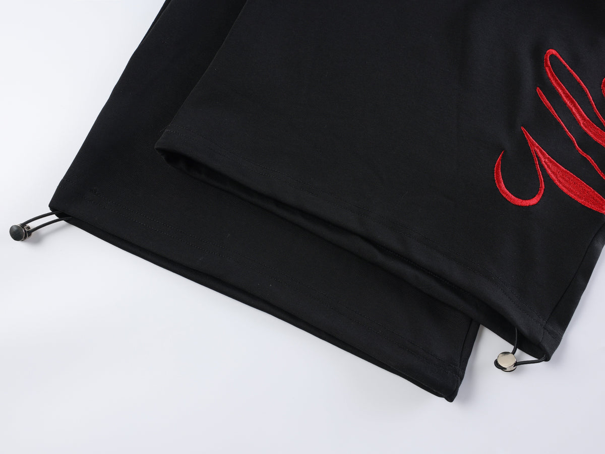 VLEX OFFICIAL RACING EMBLEM GRAPHIC SWEATPANTS; Black; design detail