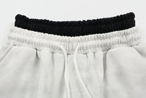VLEX OFFICIAL LION DISTRESSED DIRTY WASH SWEATPANTS; Gray; garment construction detail