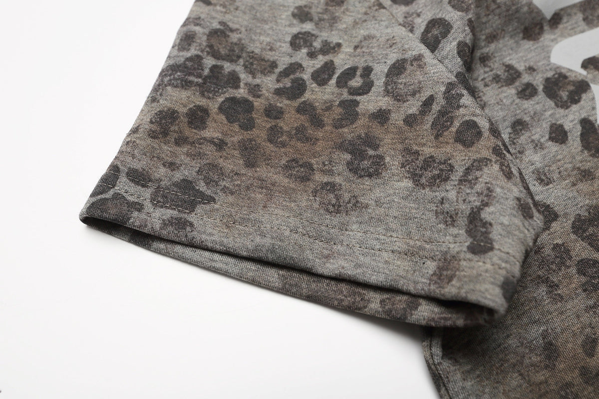 CHAN YOOU LEOPARD PRINT POLO SHIRT; Gray Leopard; garment construction detail