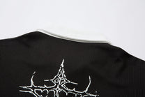 MCCNN THORN CROSS LAYERED POLO SHIRT; Black; design detail