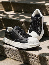 KAALIXTO STAR DETAIL SHELL TOE SNEAKERS; Black; styled product view