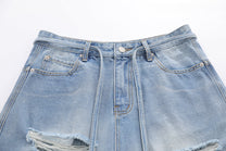 BLANKIN DISTRESSED RAW EDGE JORTS; Blue; garment construction detail