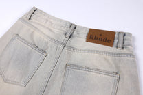 CHAOGU PEARL EMBELLISHED LIGHT WASH SHORTS; Light Gray; garment construction detail