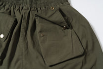 SOUNDLESS CLOUDBURST STACKED POCKET CARGO SHORTS; Olive; design detail