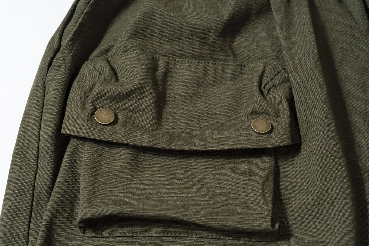 SOUNDLESS CLOUDBURST STACKED POCKET CARGO SHORTS; Olive; design detail