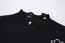 LETS ROCK CROSS EMBLEM DISTRESSED SWEATER; Black; garment construction detail