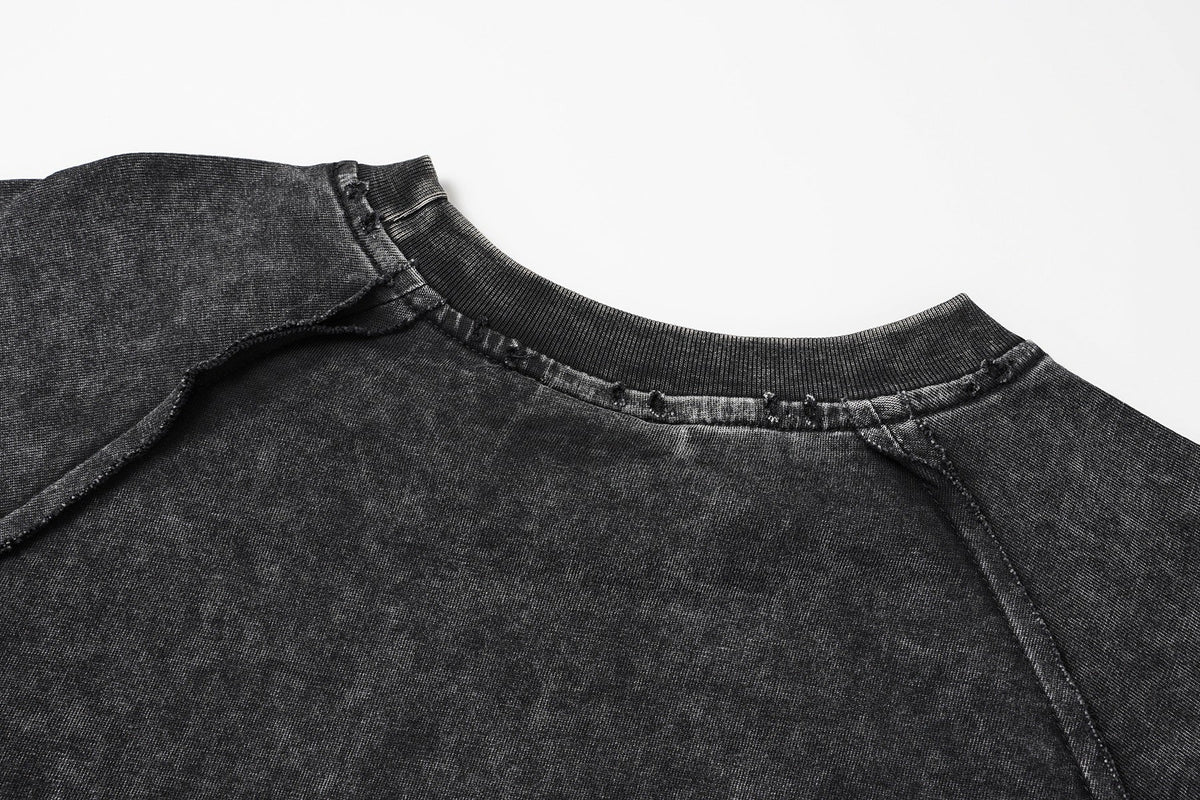 EXTREME CAUSE WASHED RAGLAN SEAM SWEATSHIRT; Black; garment construction detail