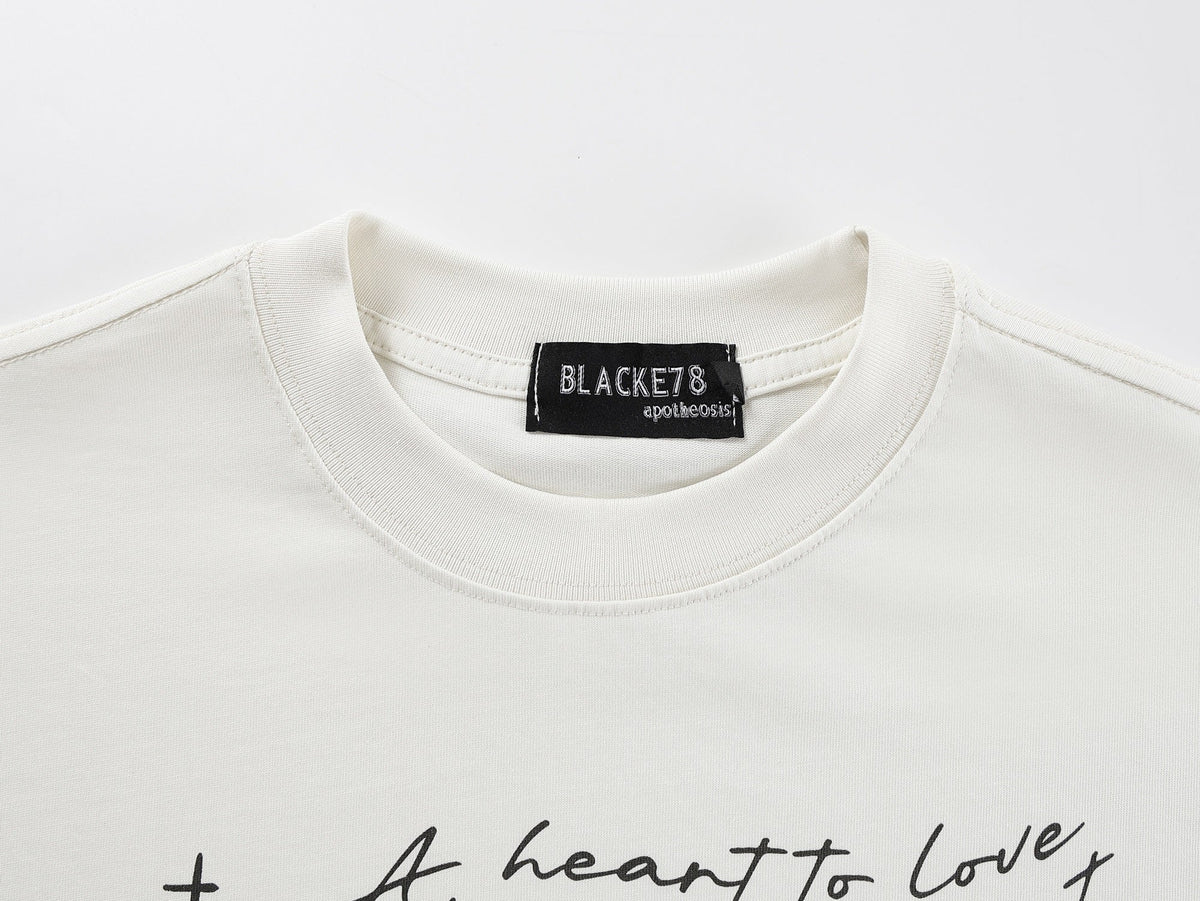 BLACK E78 SHADOW FIGURE GRAPHIC T-SHIRT; Cream; garment construction detail