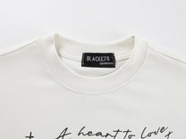BLACK E78 SHADOW FIGURE GRAPHIC T-SHIRT; Cream; garment construction detail