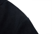 MADE EXTREME PEACE LOVE SLOGAN T-SHIRT; Black; garment construction detail