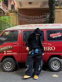 SMK MADE | Thorn Sleeve Zip Up Hoodie in Black - lifestyle view