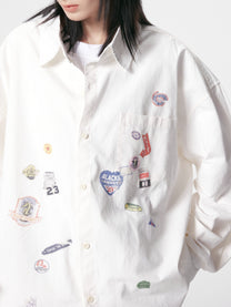 BLACK ENERGY | Badge Collage Raw Hem Shirt in White - model view