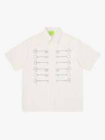 SAVAGE BASE | Embroidered Key Motif Shirt in White - front view