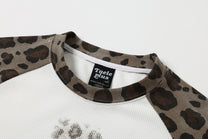 TAELE PLUS | Star Cross Leopard Sleeve Sweatshirt - product detail