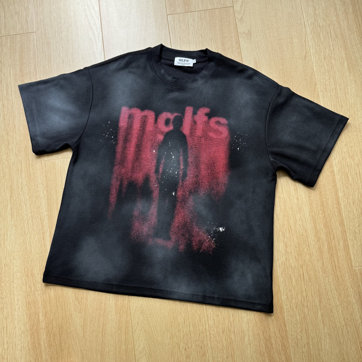 GLFS | Blurred Figure Graphic Relaxed-Fit T-Shirt in Black - product view
