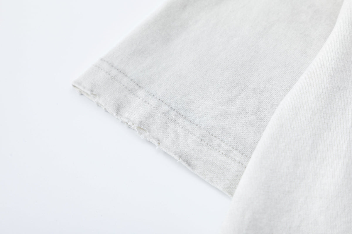TRYTHMCLU | Distressed Text Collage T-Shirt - product detail